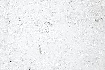 White painted plywood panel with peeling paint