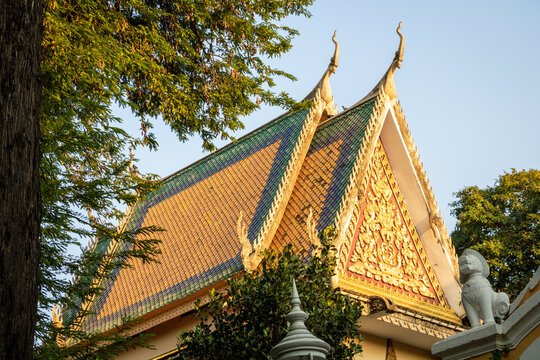 a buddhist golden and yellow monument and temple