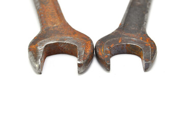 Rusty wrench on white background close-up. Tool, old, rare, vintage