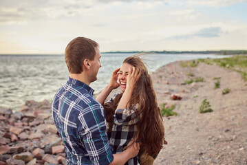 Happy couple at a lake