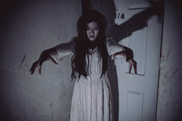 Portrait of asian woman make up ghost,Scary horror scene for background,Halloween festival...