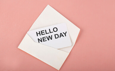 Word Writing Text HELLO NEW DAY on card on the pink background