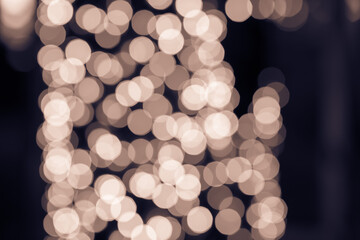 Abstract christmas lights or Vintage light sepia bokeh.