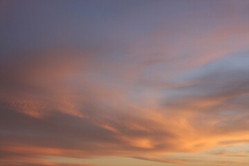 Beautiful tender clouds at the sunset time, sunset sky background