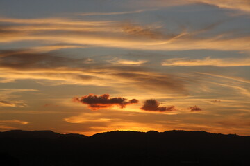 Beautiful tender clouds at the sunset time, sunset sky background