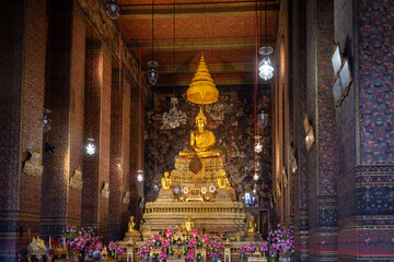 Fototapeta na wymiar Bangkok. Thailand. Wat Pho, with few tourists in the Buddhist temple complex, which is also known as the Temple of the Reclining Buddha. 