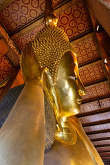 Bangkok. Thailand. Wat Pho, with few tourists in the Buddhist temple complex, which is also known as the Temple of the Reclining Buddha. 