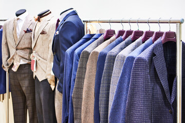 Obraz premium Men's suits in clothing store