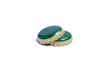 Beer bottle cap or Two of metal green cap stacked, used for glass bottles, One of the top side Isolated on white background.