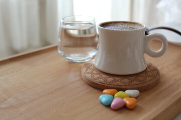Three cups of Turkish coffee on a wooden bamboo tray.
Mortar brown in white cups