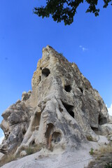 Fairy chimneys shaped by blue sky and wind.
Volcanic rocks formed by wind
