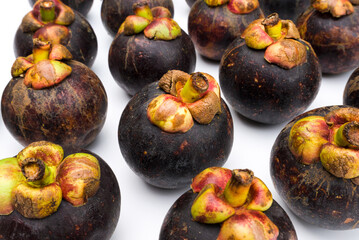 Mangosteen isolated on white background.