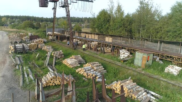 The woodworking plant is not far from the city in the forest.Aerial photography.Top view.Processing of the tree.Forest