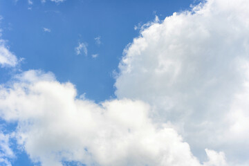 Blue sky with white clouds in sunny day.