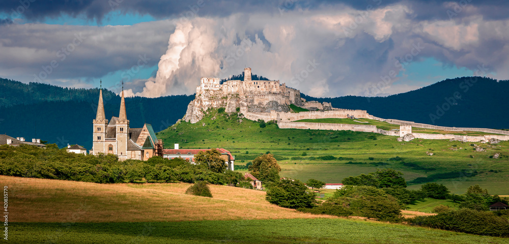 Wall mural spis castle and the spis chapter at the sunset,slovakia