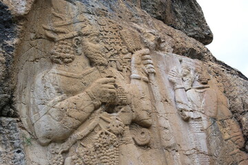 The world's first agricultural rock relief.The Storm God Tarhundas and the king of the region Varpalavas are depicted.
Historical rock monument.
