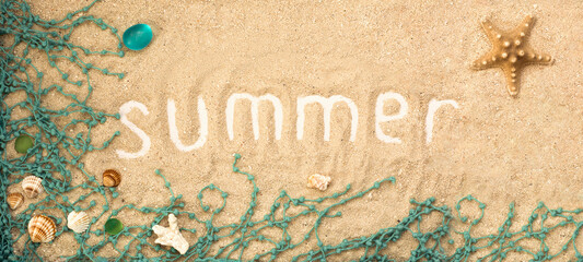 Summer inscription with seashells and details on sandy background. Summer flatlay