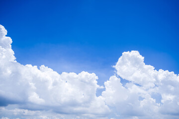 Naklejka na ściany i meble Blue sky with white clouds in fresh day.