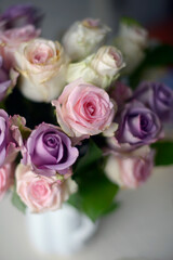 Obraz na płótnie Canvas pastel pink and purple roses 