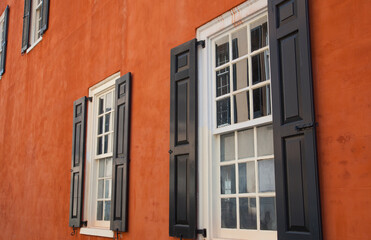 Fototapeta na wymiar Colorful building windows in Charleston, South Carolina, USA.