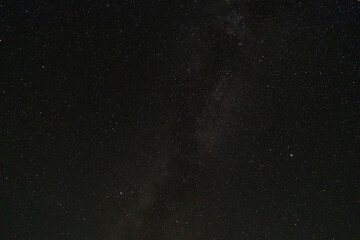 The night sky is covered with stars. Beautiful space background.