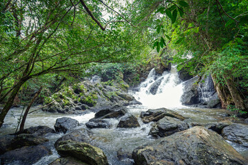 Naklejka na ściany i meble Pha Kluai Mai Waterfall ​at Khao Yai National Park, Pak Chong, Nakhon Ratchasima, Thailand