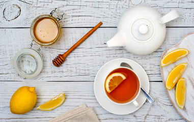 Obraz na płótnie Canvas Tea with lemon and honey