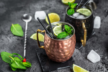 Cold Moscow Mules cocktail with ginger beer, vodka, lime