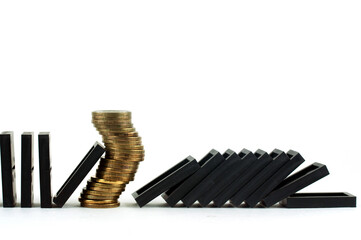 coins and dominoes, the concept of the financial crisis