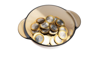 a handful of commemorative coins. on a white background