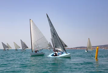 Wandaufkleber sailing Regatta on sea © yanlev