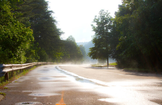 Wet road after rain near the Ocoee River in Ducktown, Tennessee, USA.