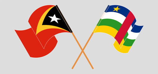 Crossed and waving flags of East Timor and Central African Republic