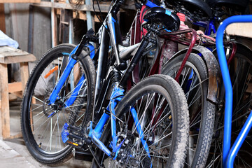 Fototapeta na wymiar Old bicycles are in the barn.