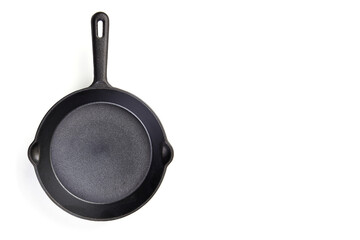 Traditional Cast iron frying pan, isolated on white background. High resolution image