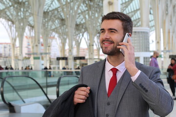 Businessman calling from train station