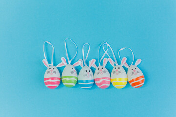 Easter. Easter decor on a blue background. Quarantine. Coronavirus.