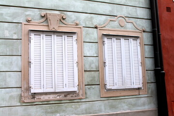 old wooden window with shutters