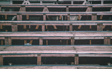 Grandstand. Wooden seats on the street. Outdoor wooden steps for climbing or descending.