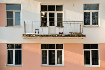 Six windows of the house. The facade of an apartment building