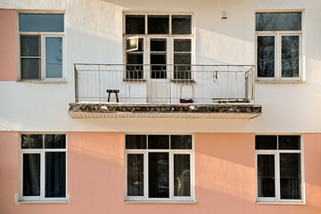 Fototapeta premium Six windows of the house. The facade of an apartment building