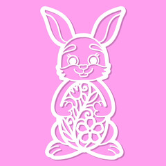 Laser cutting template. Easter bunny holds an egg in its paws. For cutting from any materials. Vector