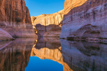 Utah, Glen Canyon National Recreation Area. Abstract reflection of stained sandstone wall.