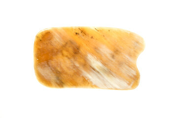 Jade guasha for spa treatments, massage stone on white background.Isolated.Chinese traditional massage - Gua Sha with stone.Jade massage scraper, gemstone .