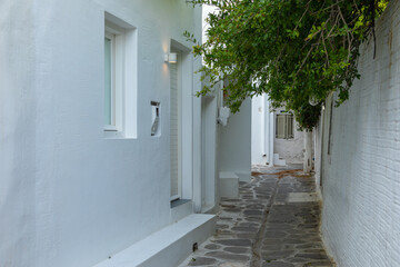 Narrow street of the old town with, Parikia, Paros Island, Greece.