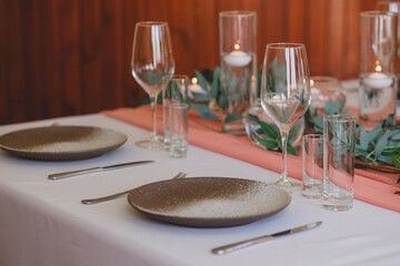Wedding boho table setting and decor. Festive dinner. 