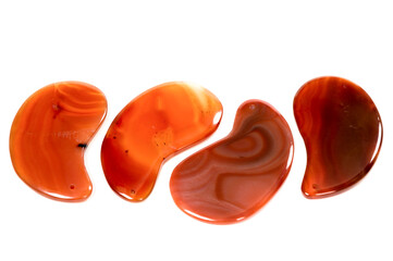 Jade guasha for spa treatments, massage stone on white background.Isolated.Chinese traditional massage - Gua Sha with stone.Jade massage scraper, gemstone .