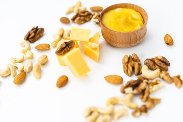 Honey and cheeses on white background