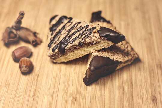 Handmade nut watches with chocolate and hazelnuts, german dessert, Nussecken