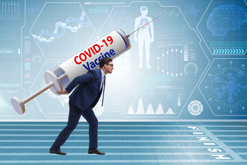 Businessman in covid-19 coronavirus vaccination concept